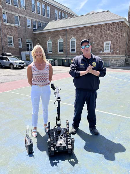 Police Detective Thomas Barker and his hazmat robot